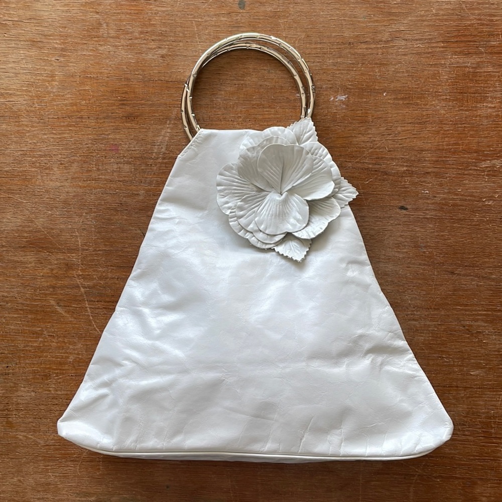 Junior Drake white leather handbag with metal handles